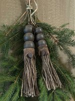 Houten klos met touw| ornament aan touw C Aura Peeperkorn  (grootste)