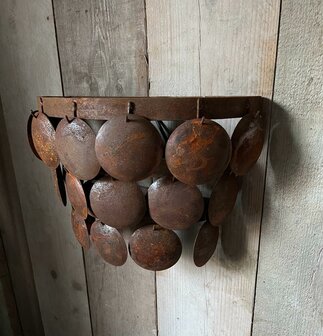 Schijfjeslamp roest voor aan de wand