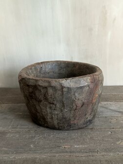 Oude houten vijzel Luksa