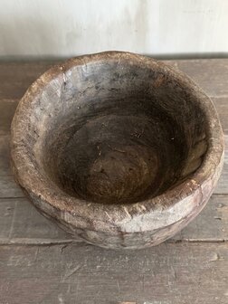 Oude houten vijzel Luksa