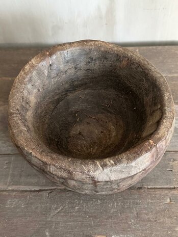 Oude houten vijzel Luksa